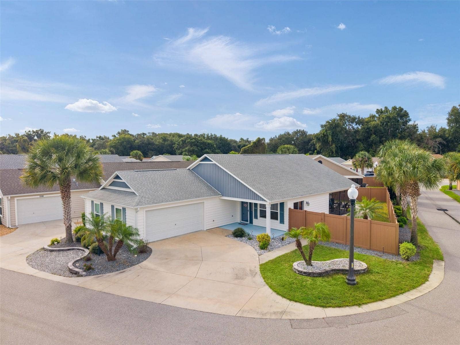 Mockingbird Villas nestled along the property line of The Villages & farmland