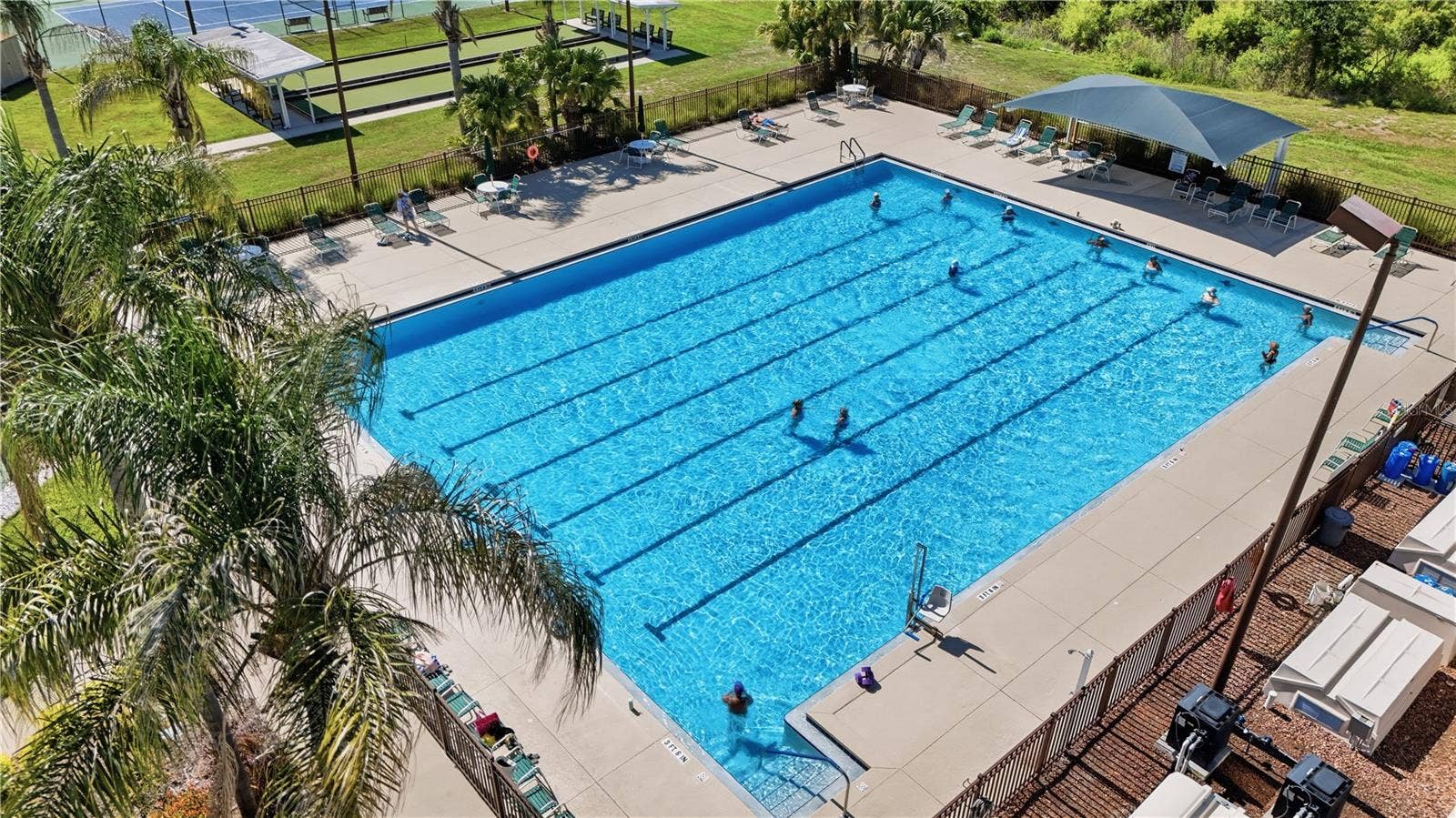 21736 PRINCESS GRACE COURT, Leesburg, FL 34748 The OUTDOOR POOL is perfect for taking laps or just lounging poolside.