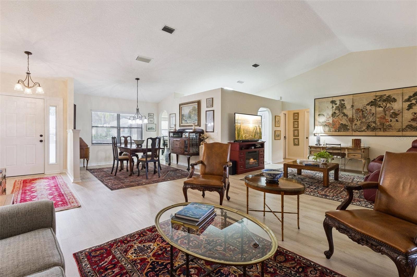 21736 PRINCESS GRACE COURT, Leesburg, FL 34748 LIVING & DINING AREAS looking toward kitchen