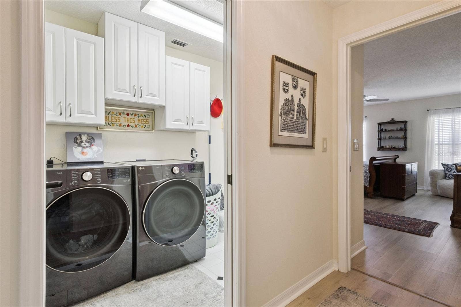 21736 PRINCESS GRACE COURT, Leesburg, FL 34748 SPACIOUS LAUNDRY ROOM IS NEXT TO PRIMARY SUITE. Washer & Dryer do NOT convey.