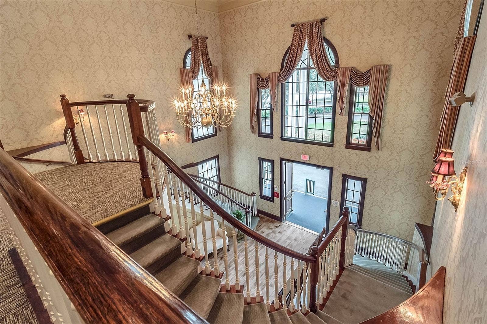 Community amenity: clubhouse staircase and two-story foyer