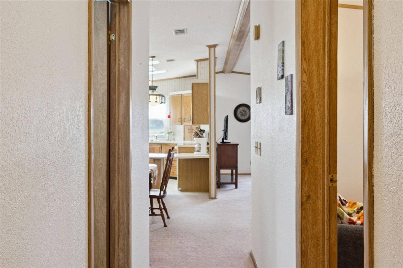 Hallway looking toward the kitchen and dining room