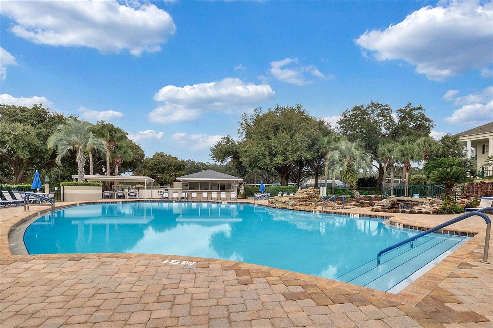 Community amenity: resort-style pool with paver deck