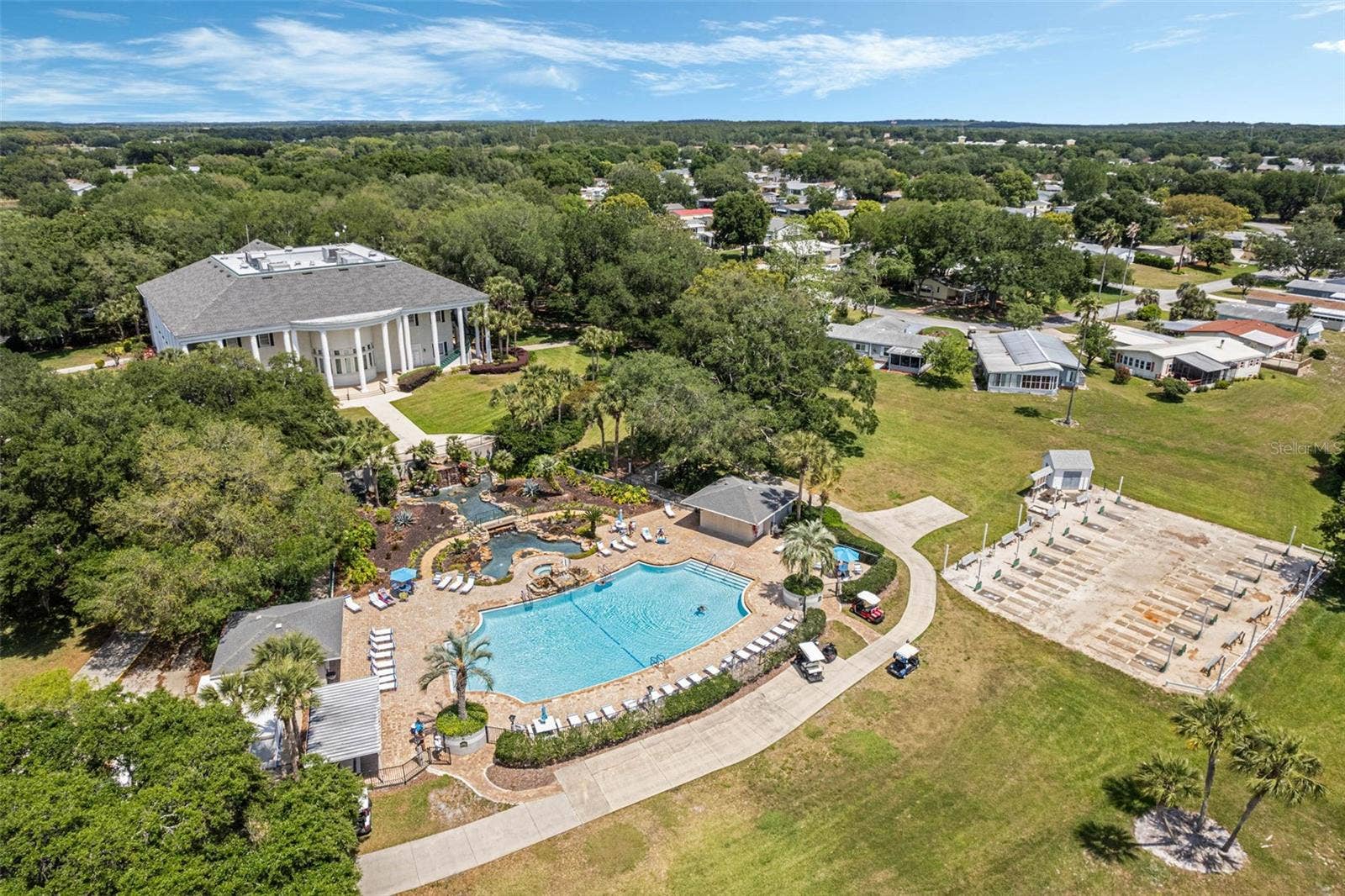 Community amenity: aerial view of the clubhouse and pool