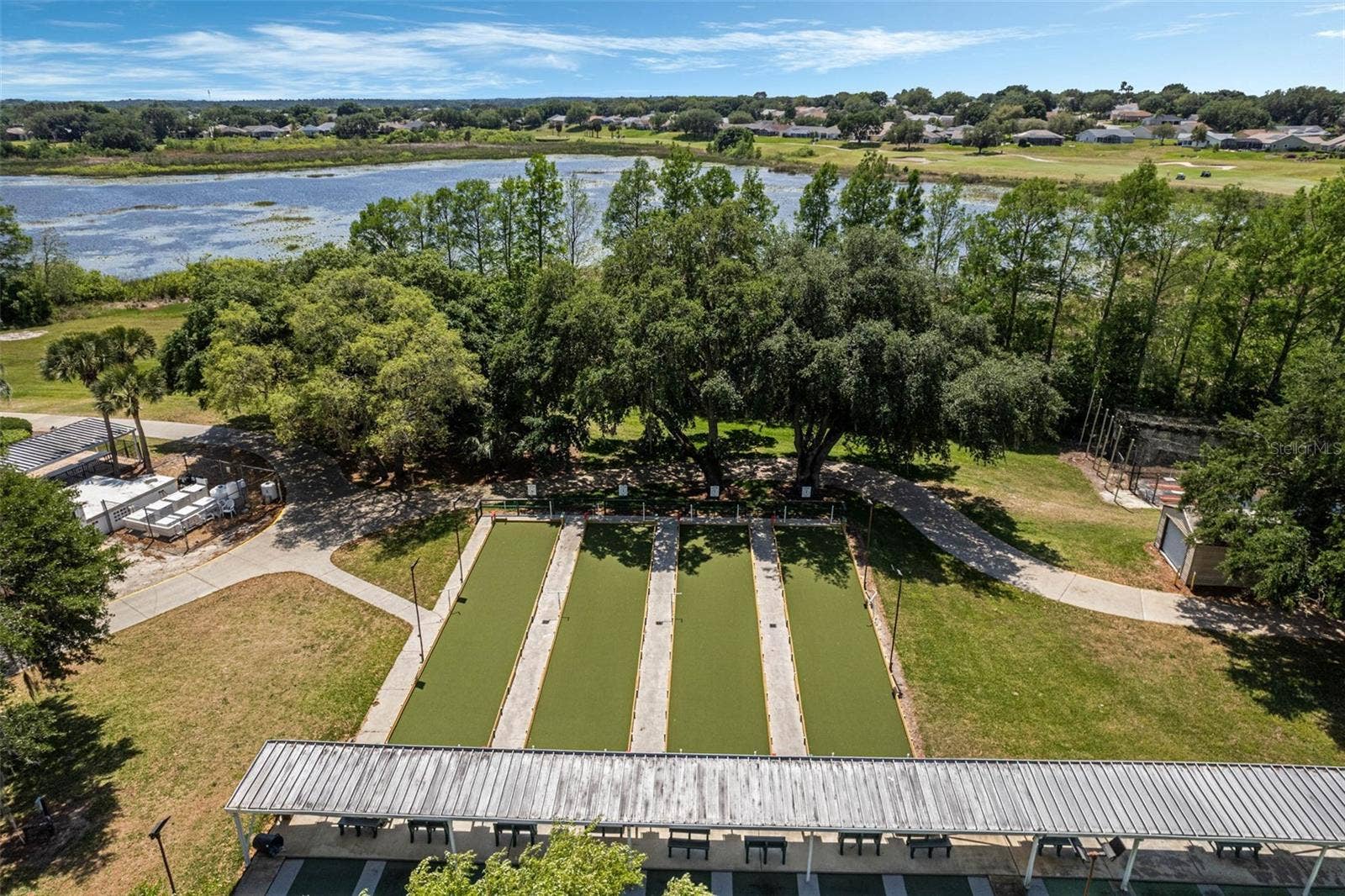 Community amenity: aerial view of the bocce courts and lake