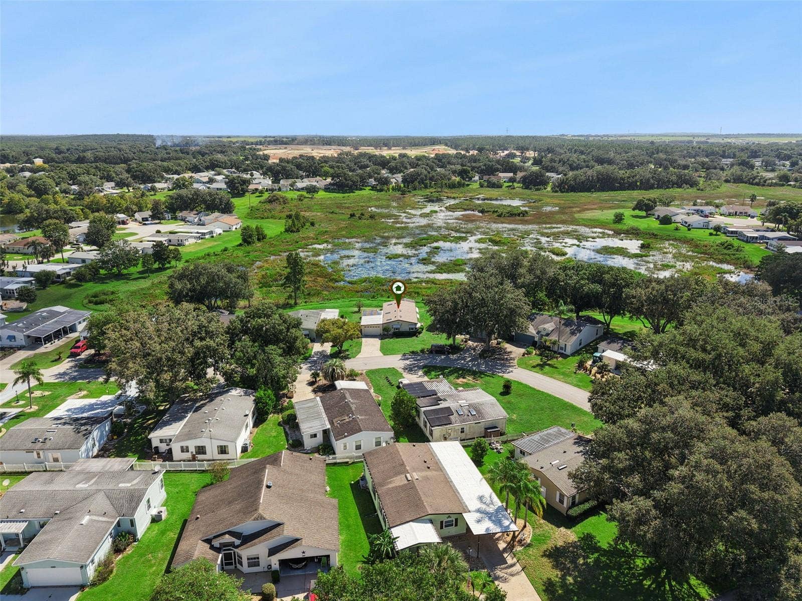 Aerial view of the neighborhood with the home marked