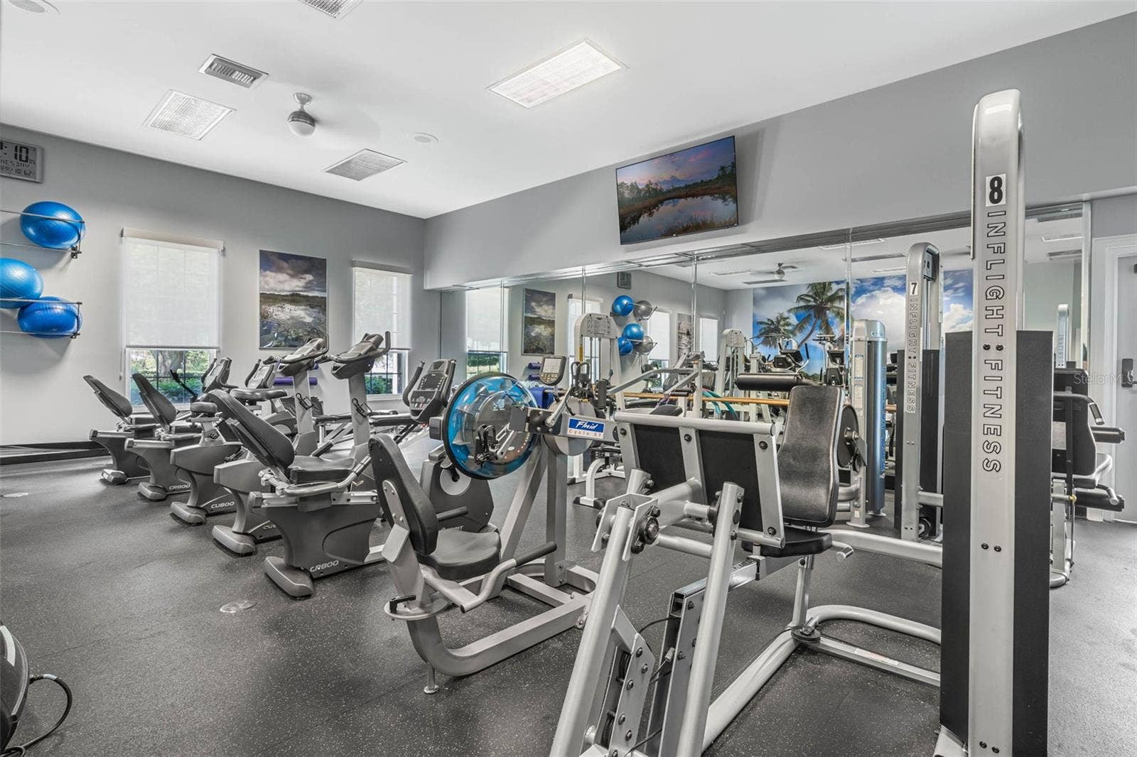 Community amenity: fitness center with exercise bikes and strength machines