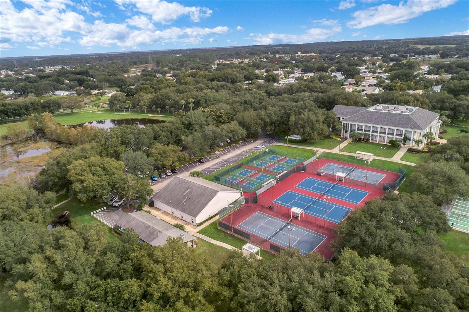 Community amenity: aerial view of the clubhouse and court complex
