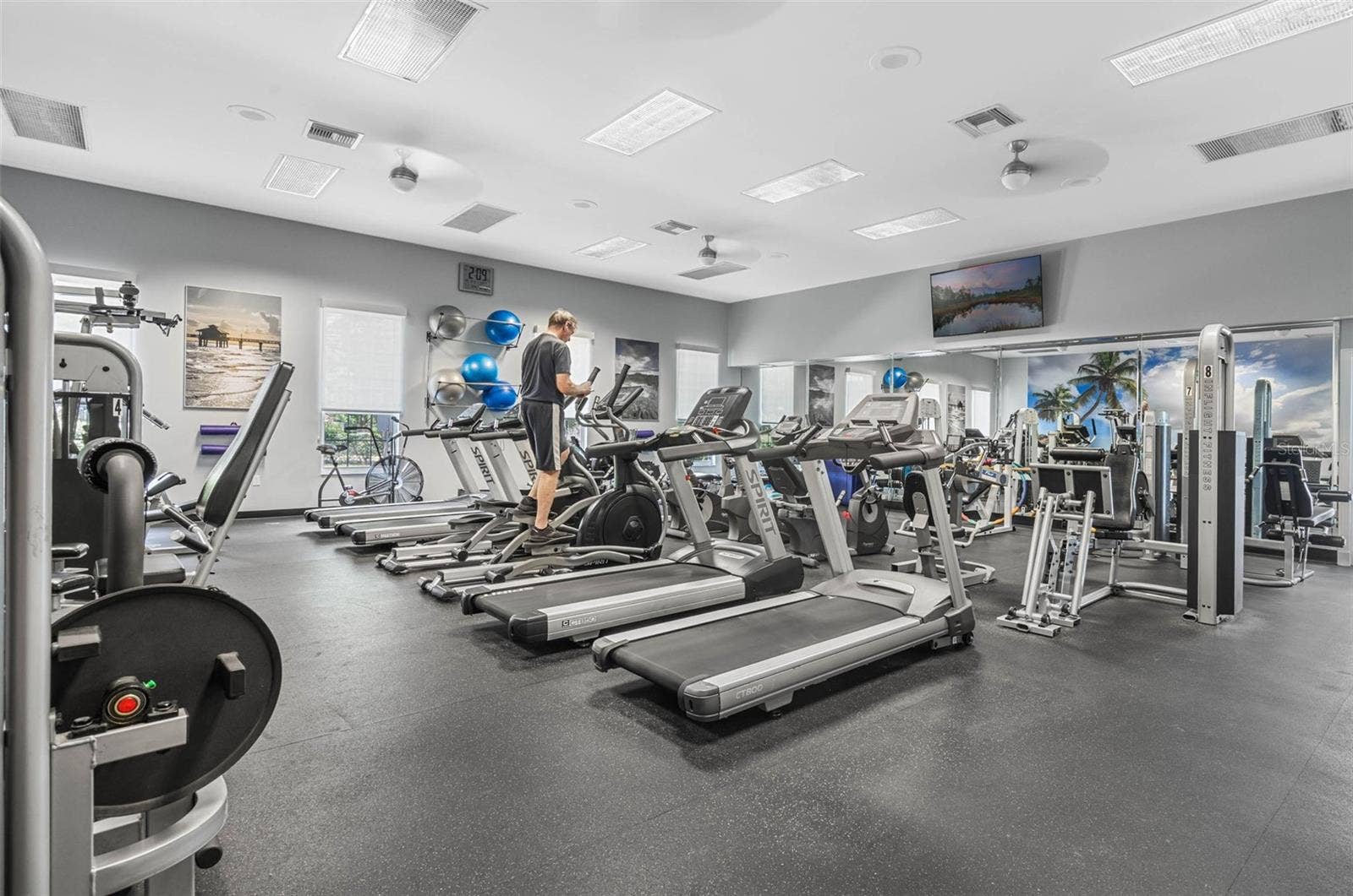 Community amenity: fitness center with treadmills and strength equipment