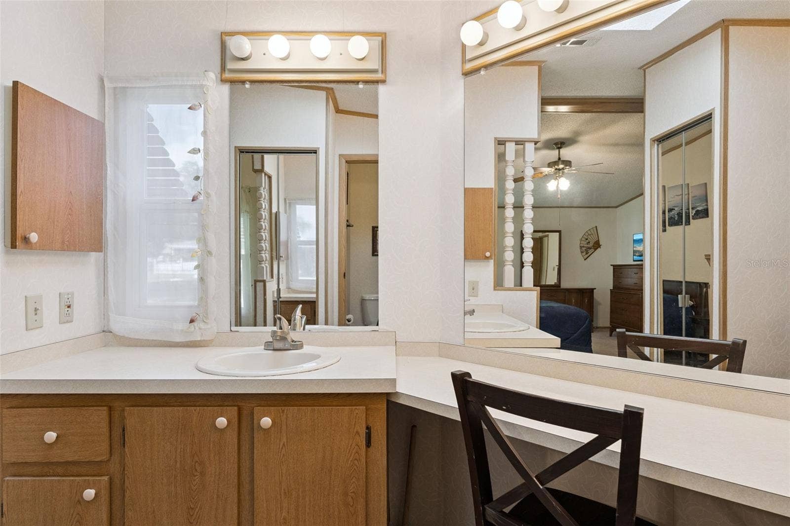 Primary bathroom vanity and built-in makeup counter