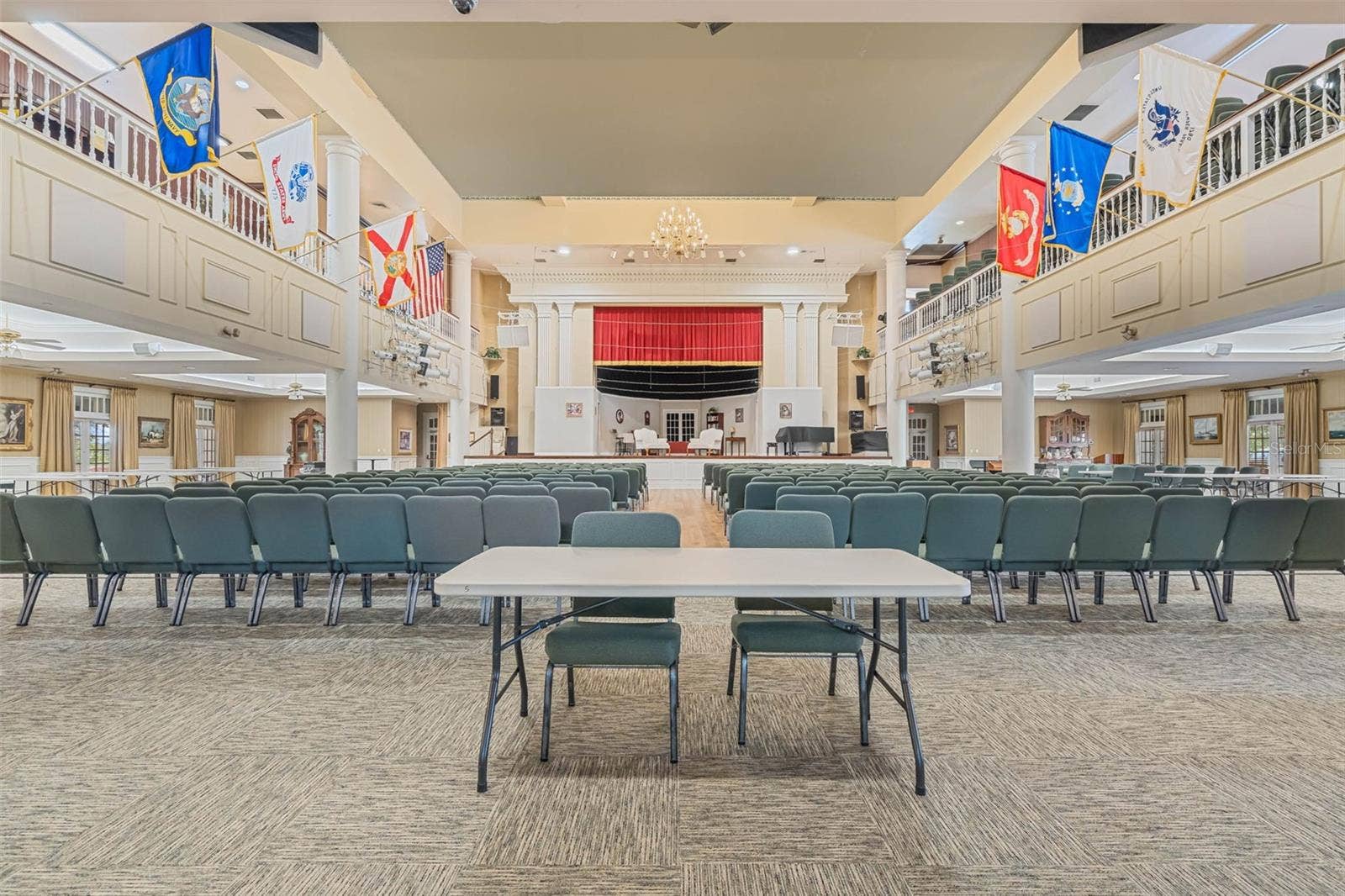 Community amenity: main hall with stage, balcony and theater seating