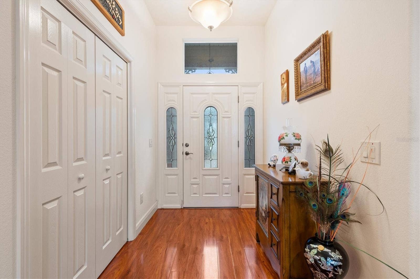 1926 ELDRIDGE LOOP, The Villages, FL 32162 Inviting Foyer with large storage closet.