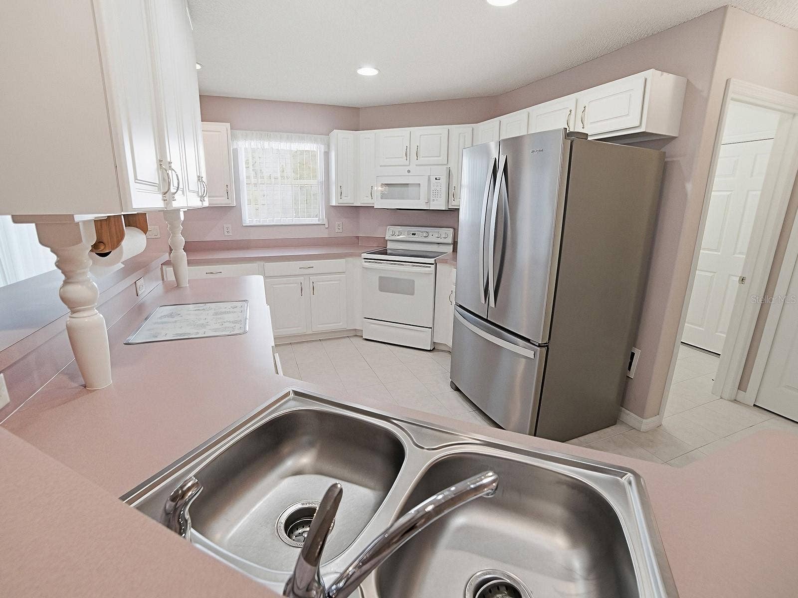 KITCHEN OPEN TO LIVING AREA