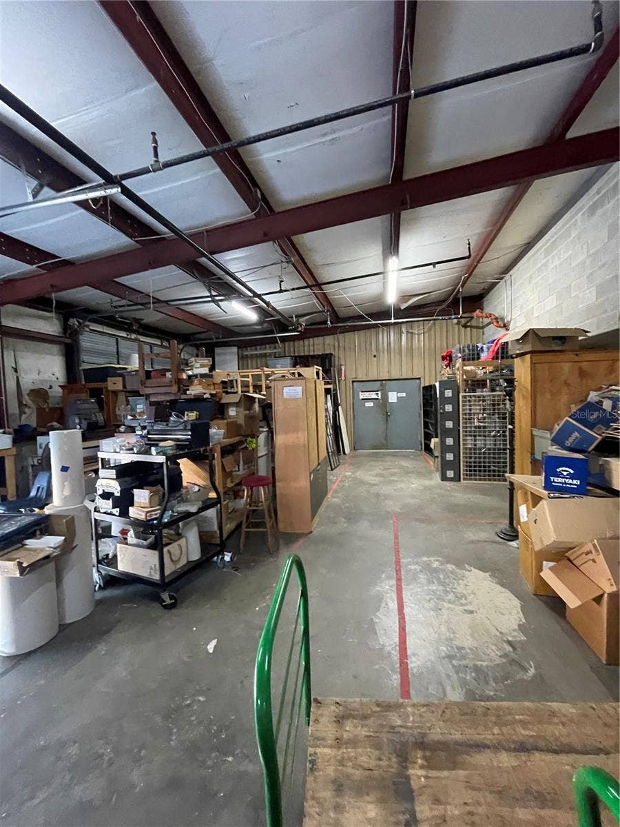 349 PLAZA DRIVE, Eustis, FL 32726 Rear of the sales floor and stock area