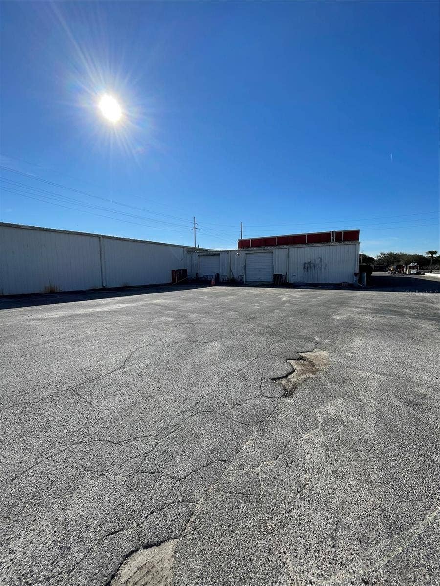 349 PLAZA DRIVE, Eustis, FL 32726 Rear parking and service area
