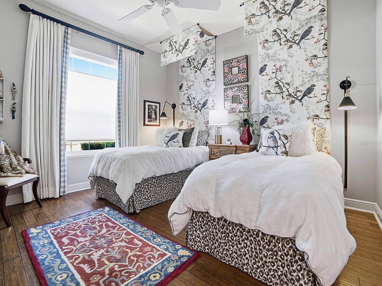 1103 MIONA SHORES DRIVE, The Villages, FL 32162 2ND GUEST ROOM WITH THE SAME BEAUTIFUL HARDWOOD FLOORINIG, CUSTOM DRAPES, AND UP-DOWN SHADES.