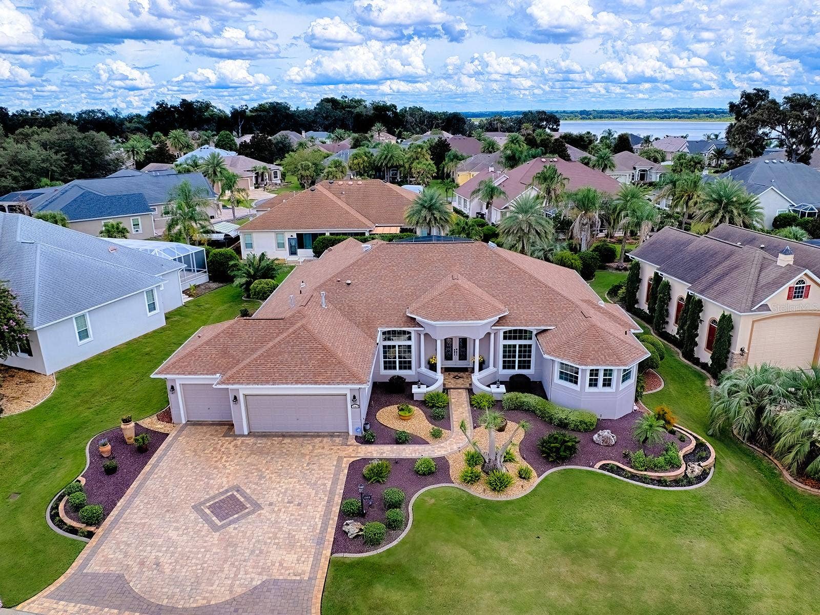 1103 MIONA SHORES DRIVE, The Villages, FL 32162 LOOK AT THIS AMAZING PAVERED DRIVEWAY! SPECTACULAR HOME INSIDE AND OUT!