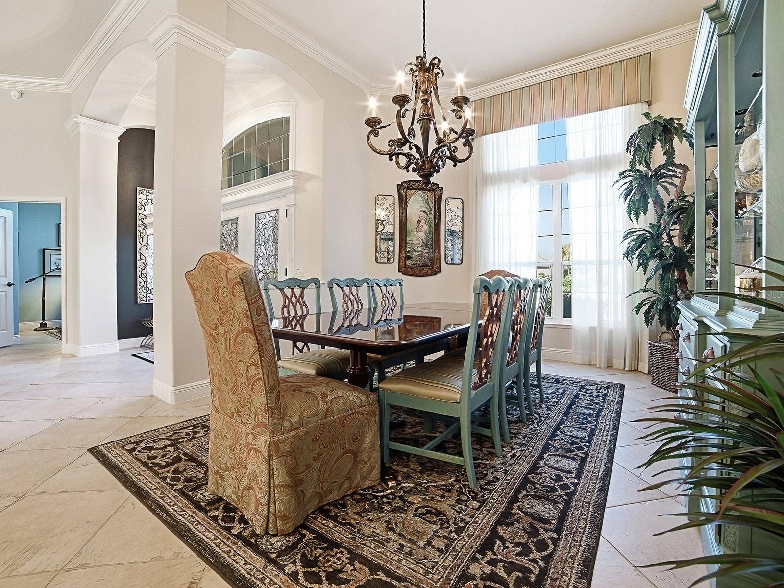 1103 MIONA SHORES DRIVE, The Villages, FL 32162 GREAT FOR ENTERTAINING WITH BEAUTIFUL CHANDELIER, VALANCE AND CUSTOM DRAPES.