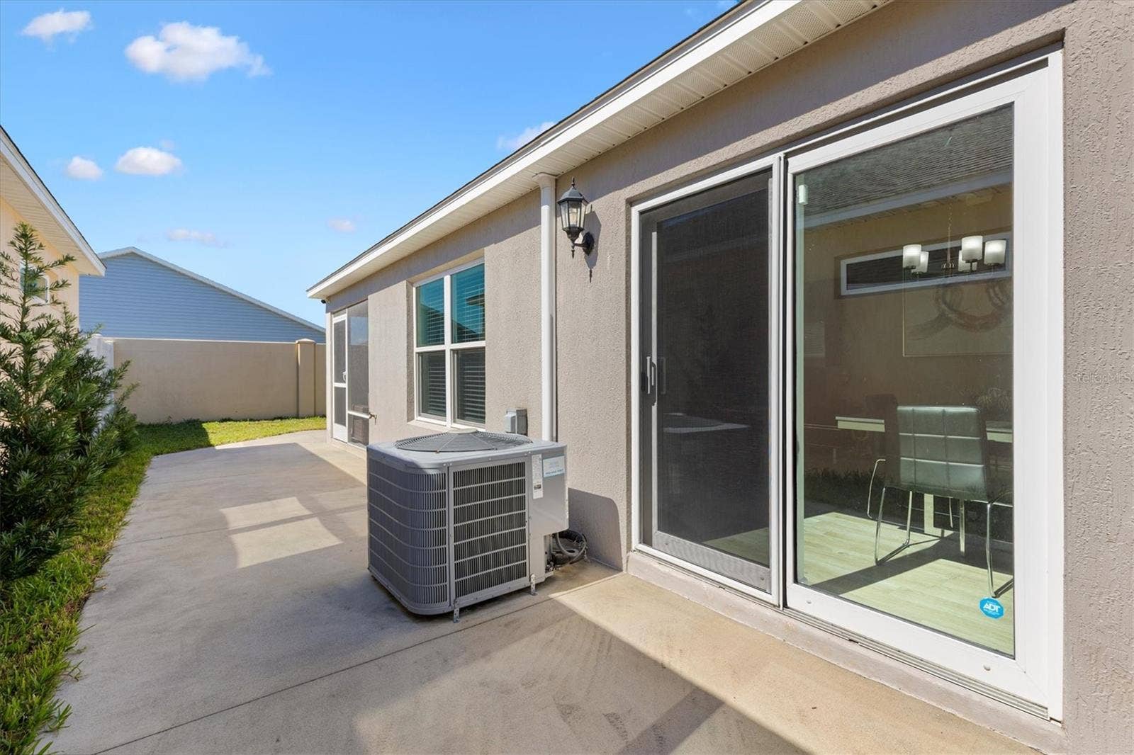 6094 RODRIGUEZ LANE, The Villages, FL 32163 Side Courtyard