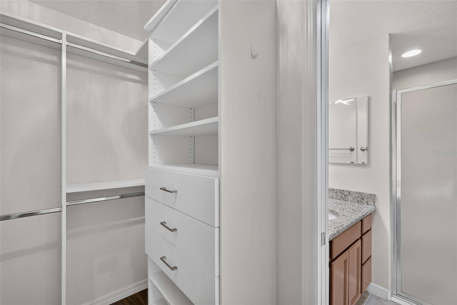 Primary Bedroom Customized Walk-In Closet