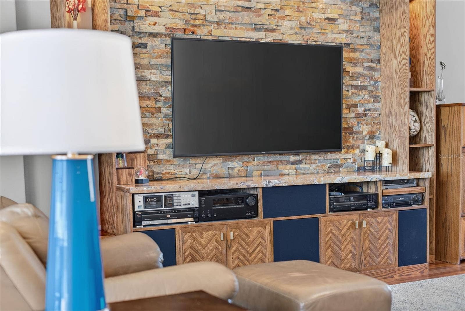 2444 PAWTUCKET PASS, Mount Dora, FL 32757 Custom made media wall with storage for all your entertainment equipment.