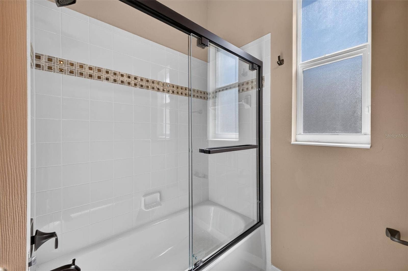 2444 PAWTUCKET PASS, Mount Dora, FL 32757 Designed for total convenience, the third bath features a shower/tub combination to suit every guest's preference.