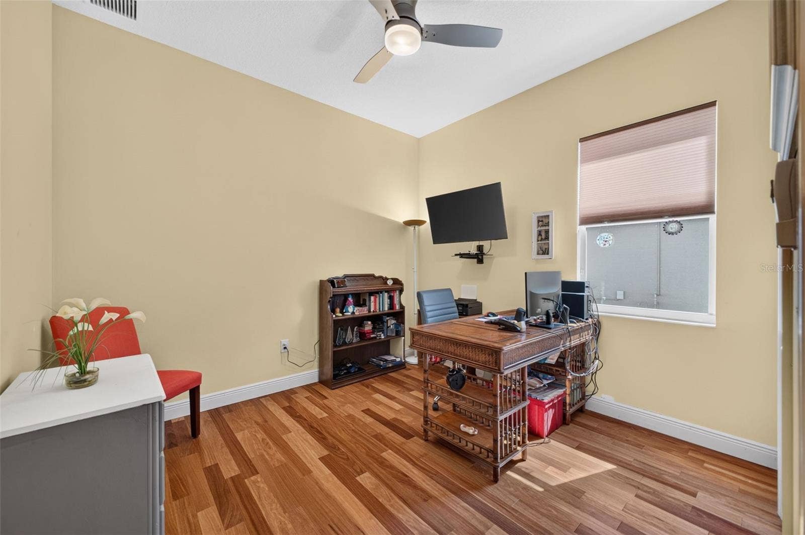 2444 PAWTUCKET PASS, Mount Dora, FL 32757 Offering versatile living space, the second bedroom functions beautifully as a quiet home office or a spacious guest retreat.