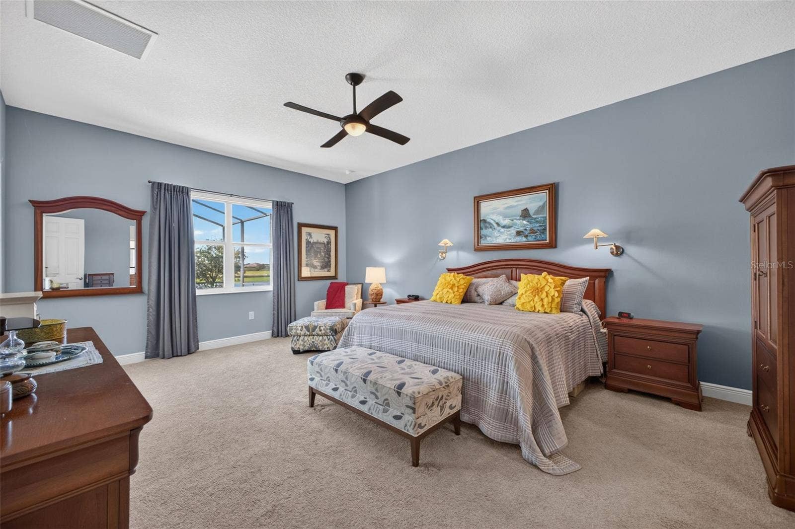 2444 PAWTUCKET PASS, Mount Dora, FL 32757 Bright, airy, and exceptionally spacious, this primary retreat features generous dual walk-in closets and a beautifully appointed en-suite bathroom.