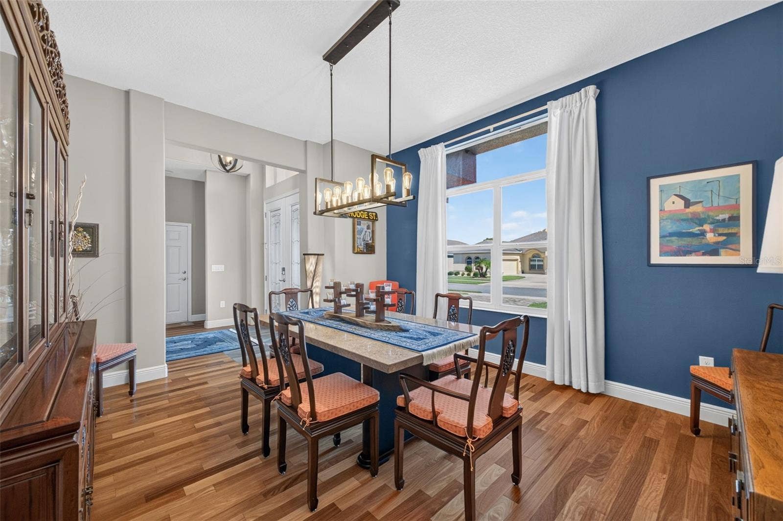 2444 PAWTUCKET PASS, Mount Dora, FL 32757 The spacious dining room offers plenty of room to expand your table, making it easy to host family dinners, holiday celebrations, and neighborhood get-togethers.