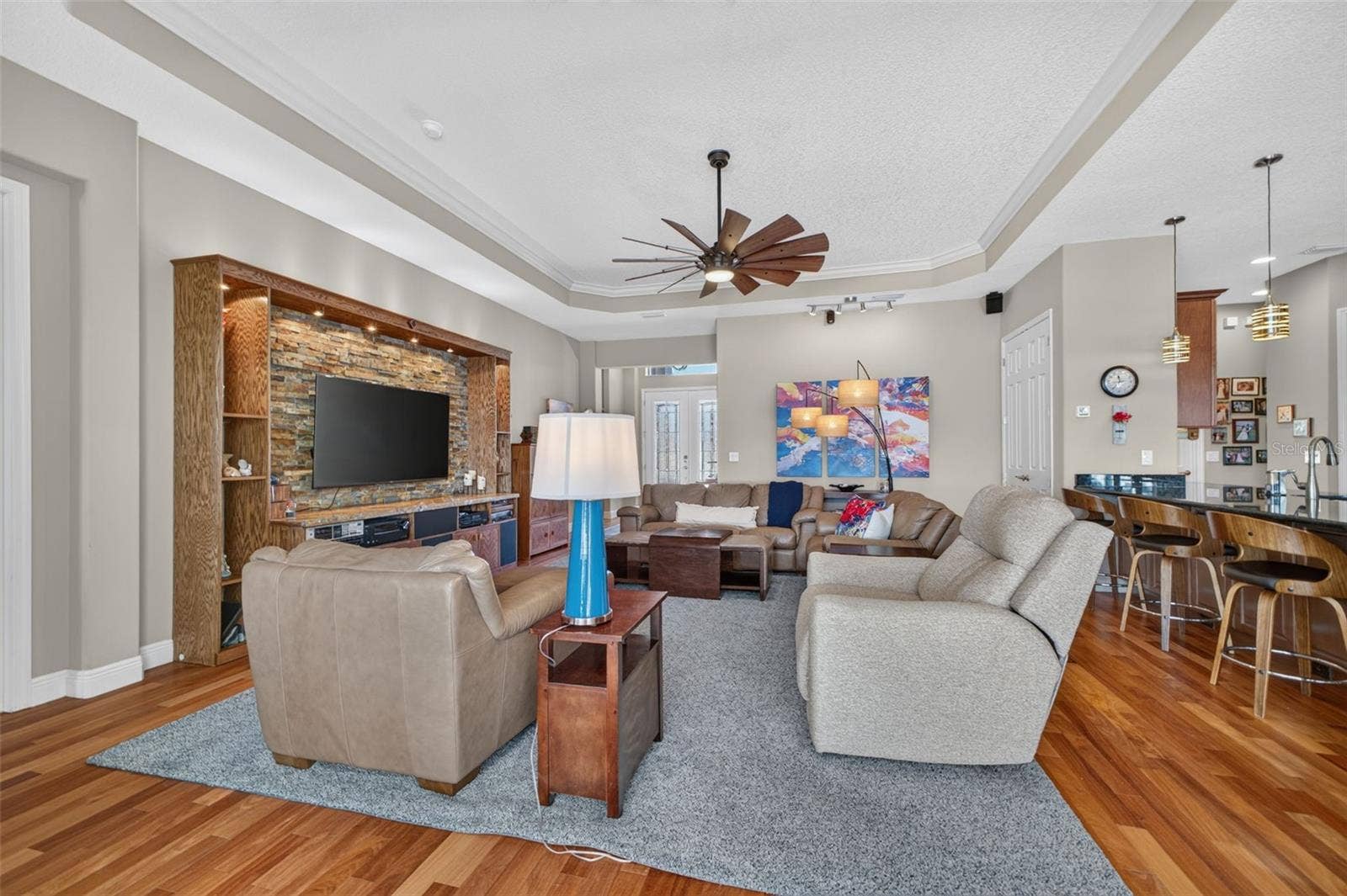 2444 PAWTUCKET PASS, Mount Dora, FL 32757 Enjoy seamless indoor-outdoor living with a captivating view of the main living space straight from the patio.