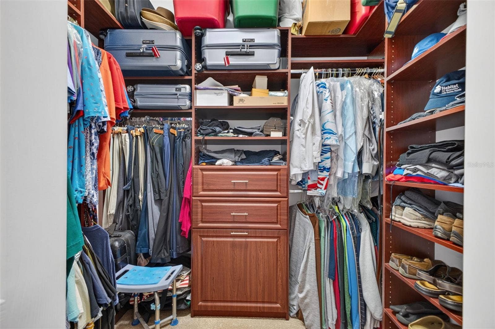 2444 PAWTUCKET PASS, Mount Dora, FL 32757 The primary suite features generous dual walk-in closets, providing ample room for extensive wardrobes and personal storage.
