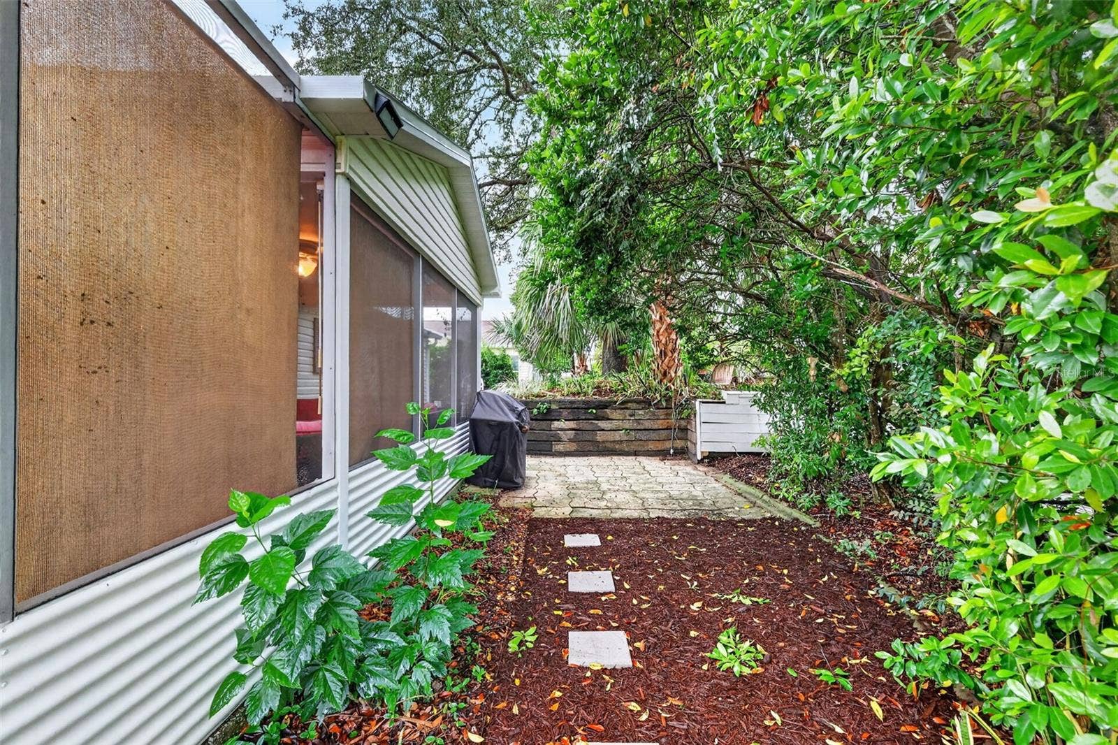Private Rear Yard with Mature Landscaping