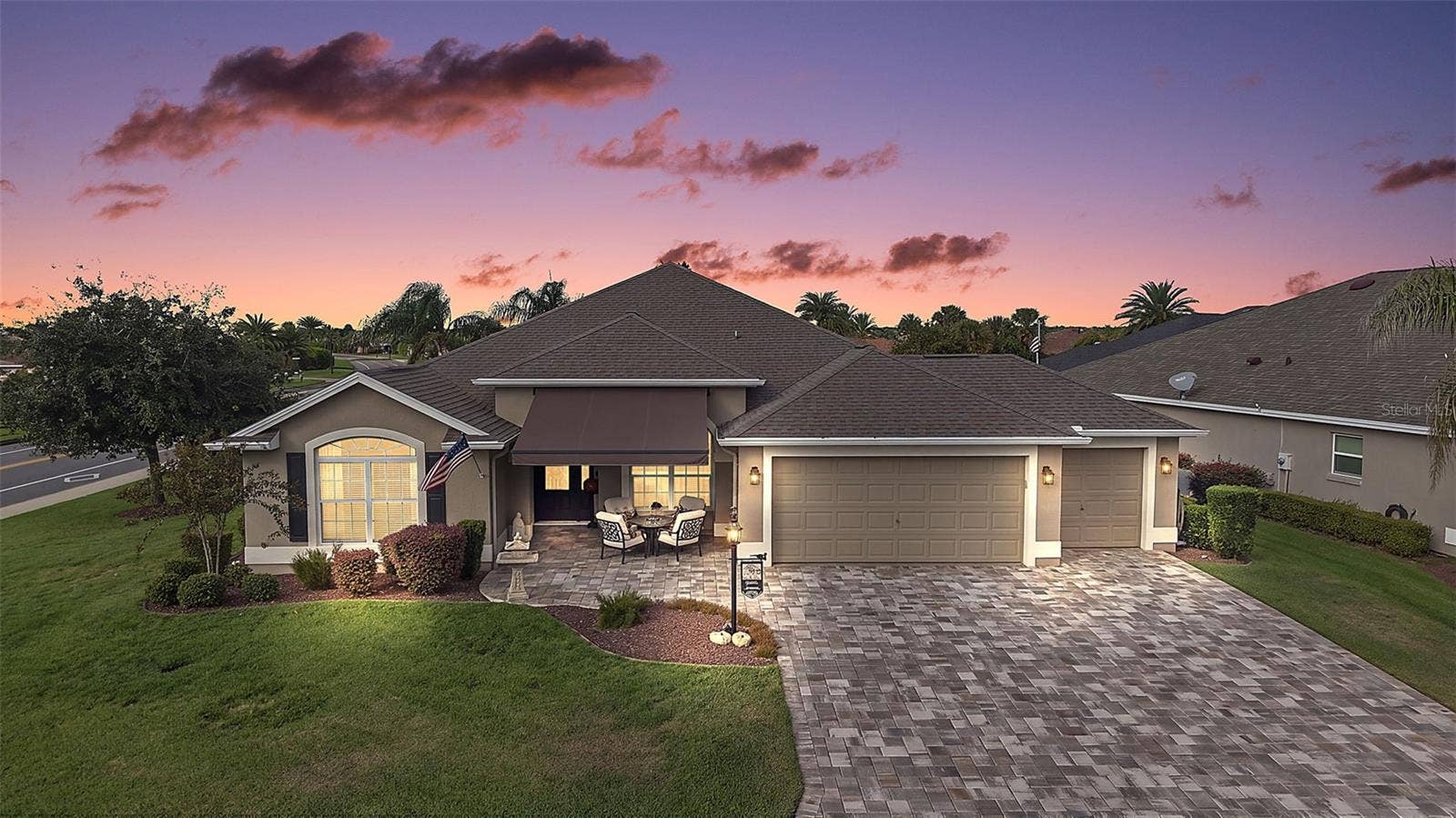1793 WAX BERRY COURT, The Villages, FL 32163 Twilight Front Elevation