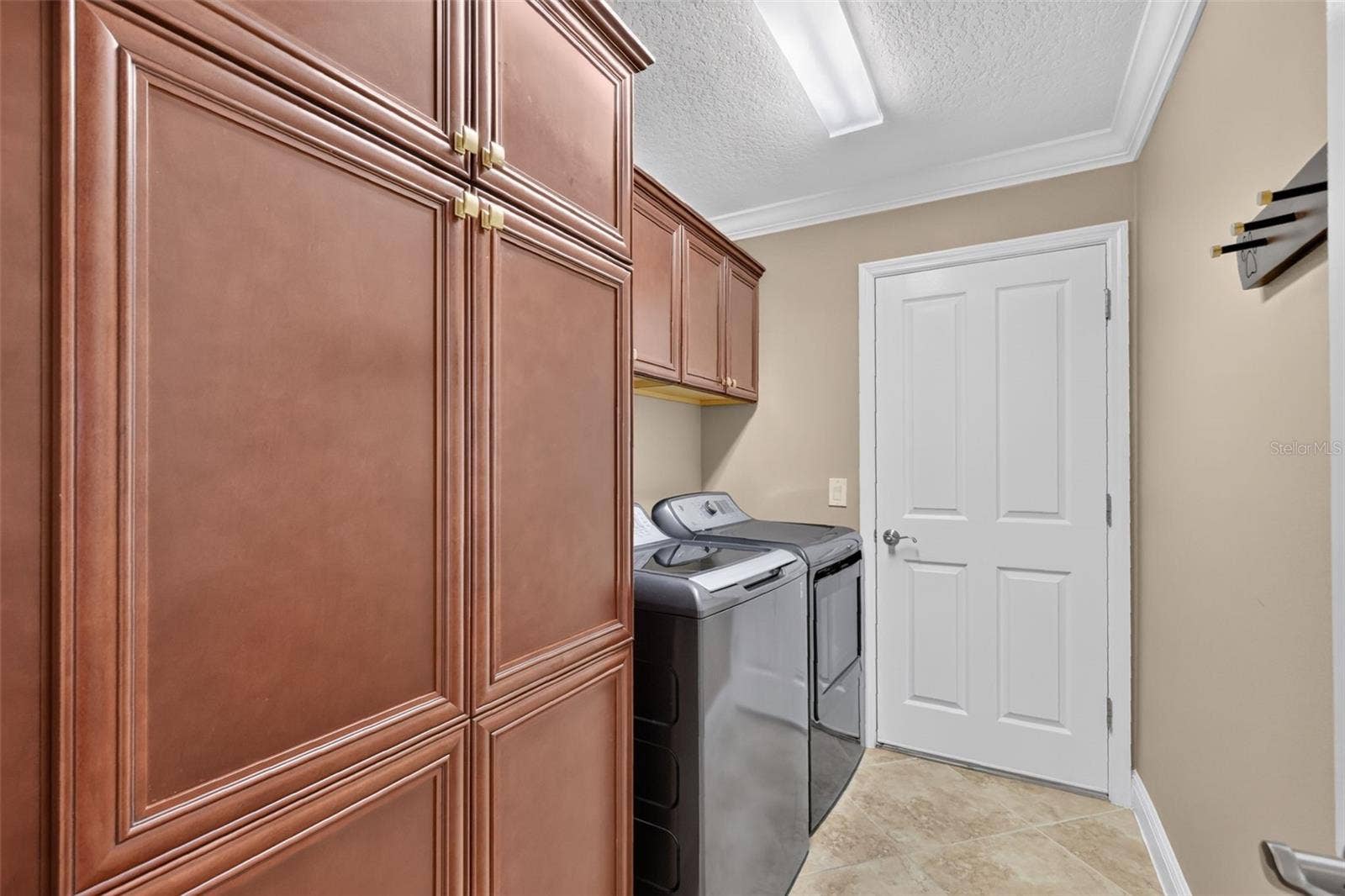 1793 WAX BERRY COURT, The Villages, FL 32163 Interior Laundry Room