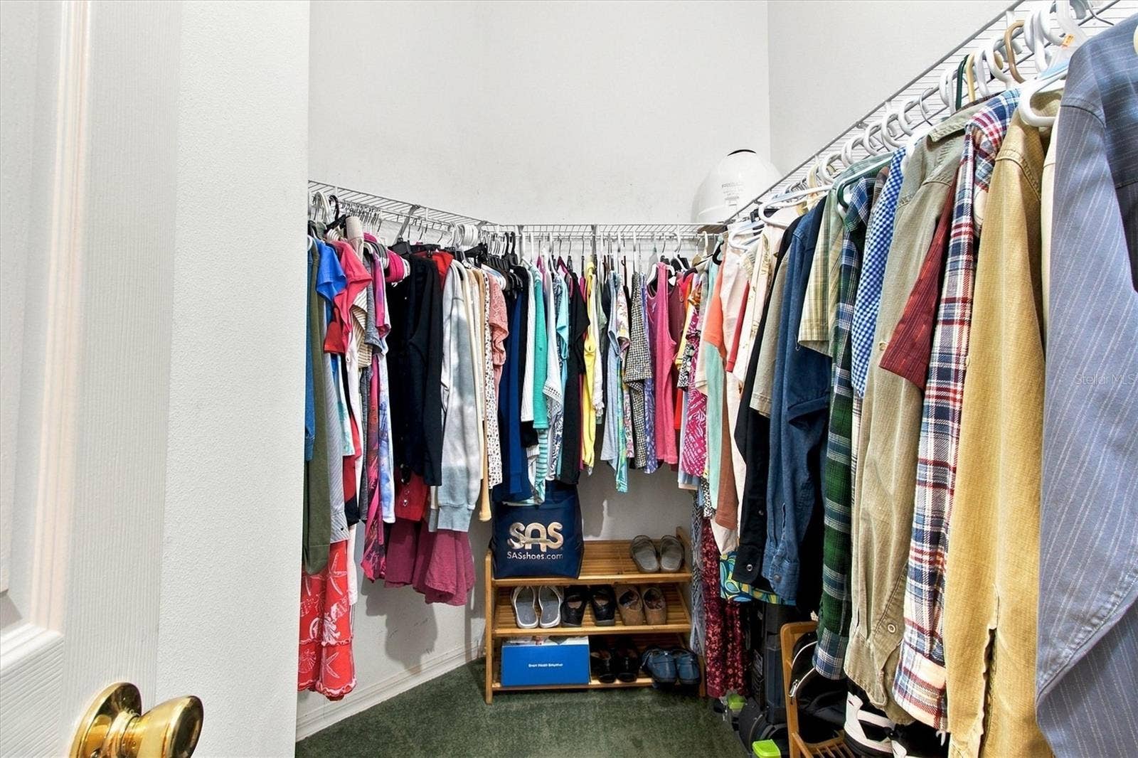 1115 SAN BERNARDO ROAD, The Villages, FL 32162 Primary walk-in closet