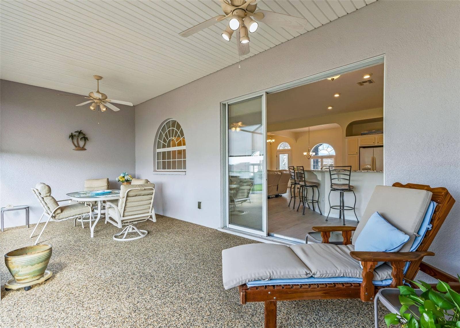 12223 SE 175TH LOOP, Summerfield, FL 34491 Covered Lanai with River rock flooring