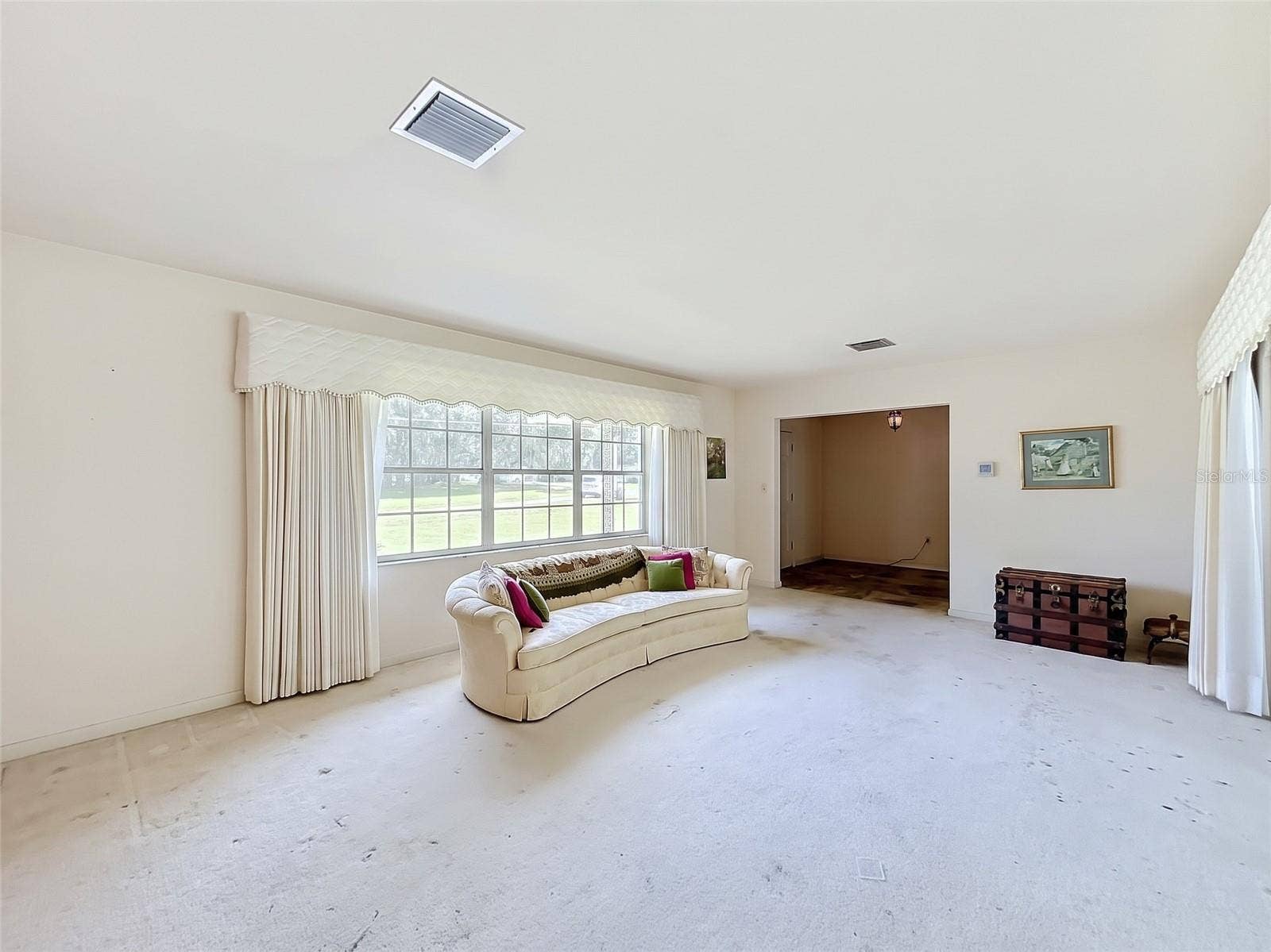 8038 SPRING DRIVE, Yalaha, FL 34797 Living Room to Foyer