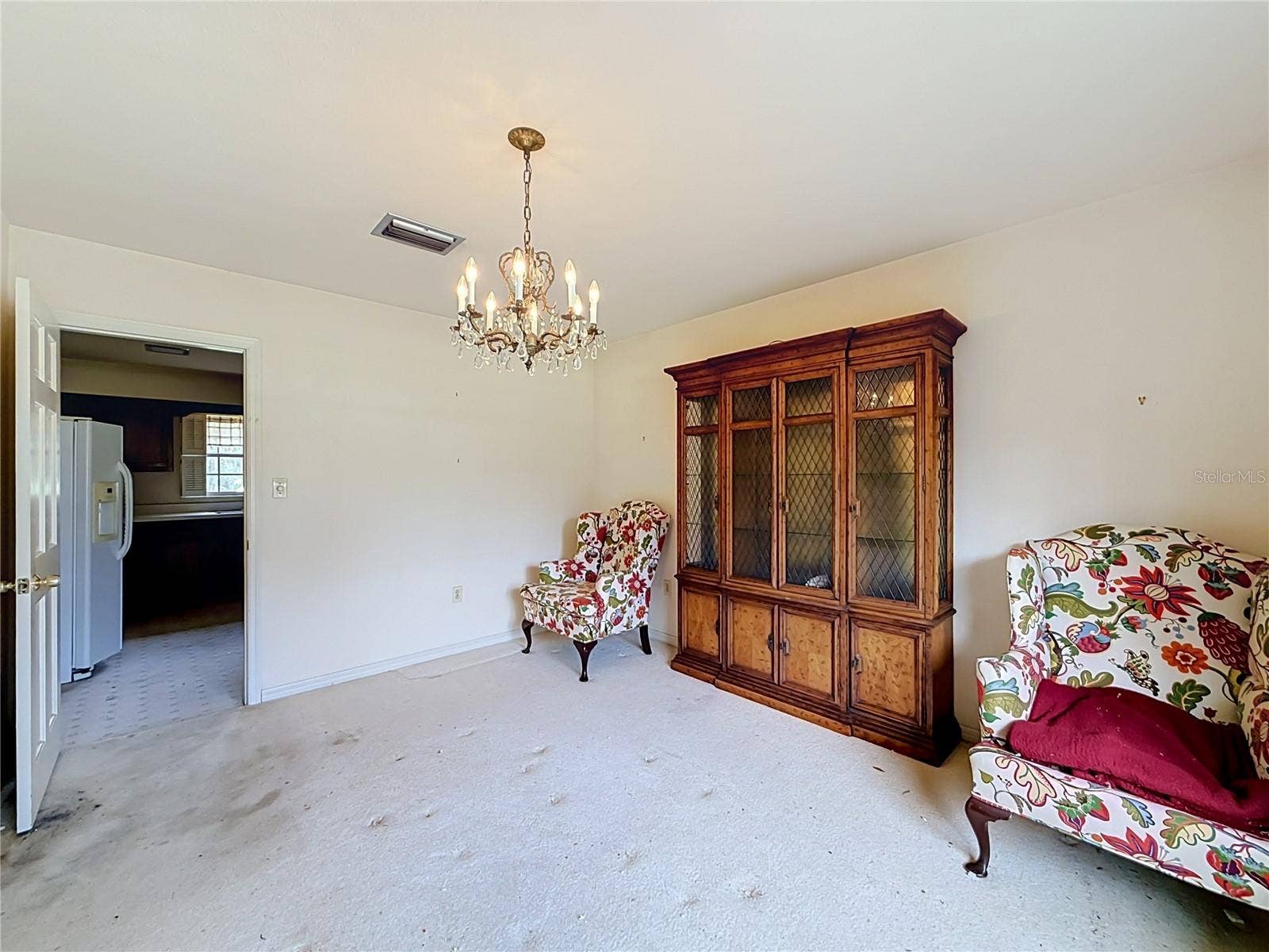 8038 SPRING DRIVE, Yalaha, FL 34797 Dining Room to Kitchen
