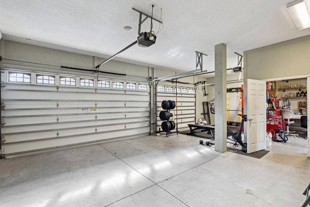 1066 CEASARS CT, Mount Dora, FL 32757 Garage interior