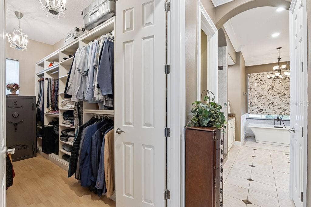 1066 CEASARS CT, Mount Dora, FL 32757 Primary Closet & Bathroom