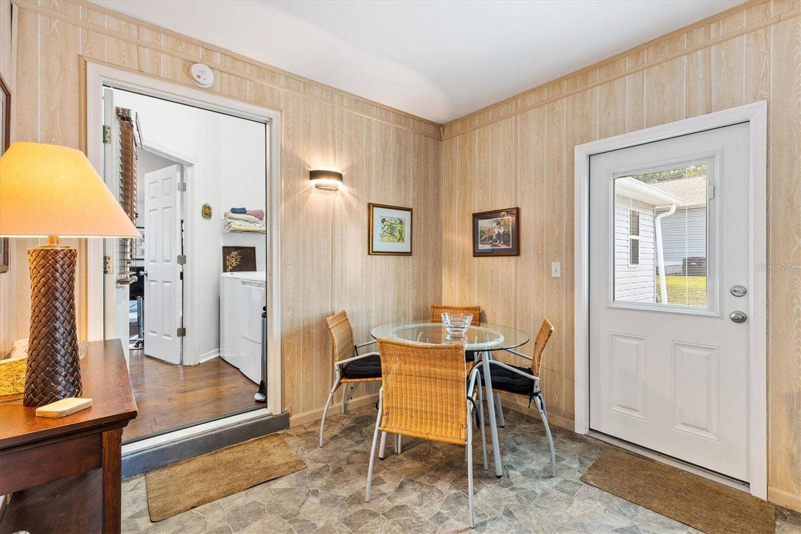 406 DEL MAR DRIVE, Lady Lake, FL 32159 Florida Room looiking into Laundry Room and Kitchen (main house)