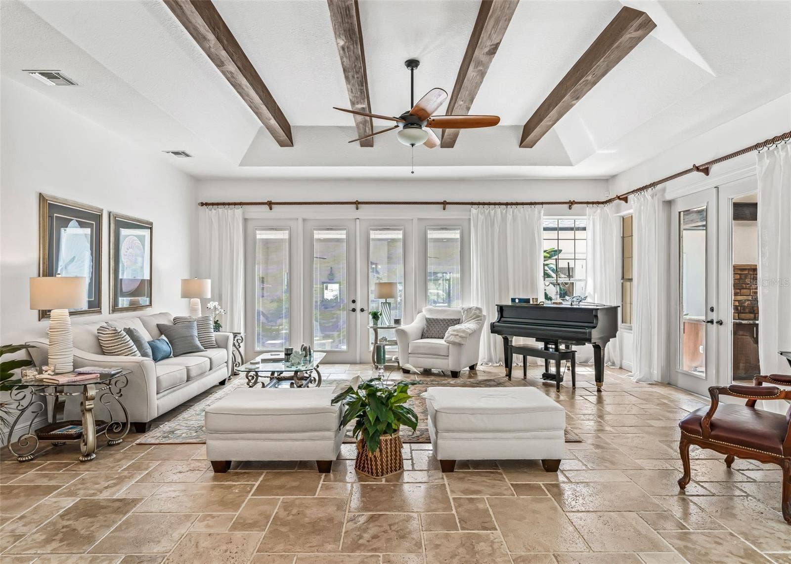Great Room with Refined Features and Extensive French Doors