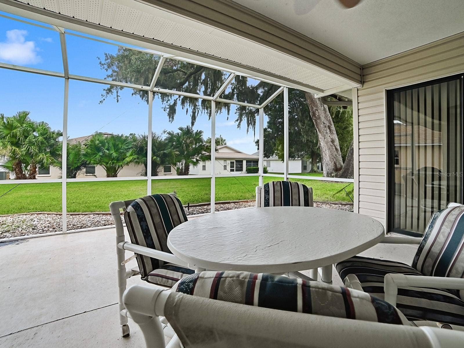 647 TIMBERCREST DRIVE, Leesburg, FL 34748 ANOTHER ANGLE IN YOUR LANAI OF THE GORGEOUS VIEW