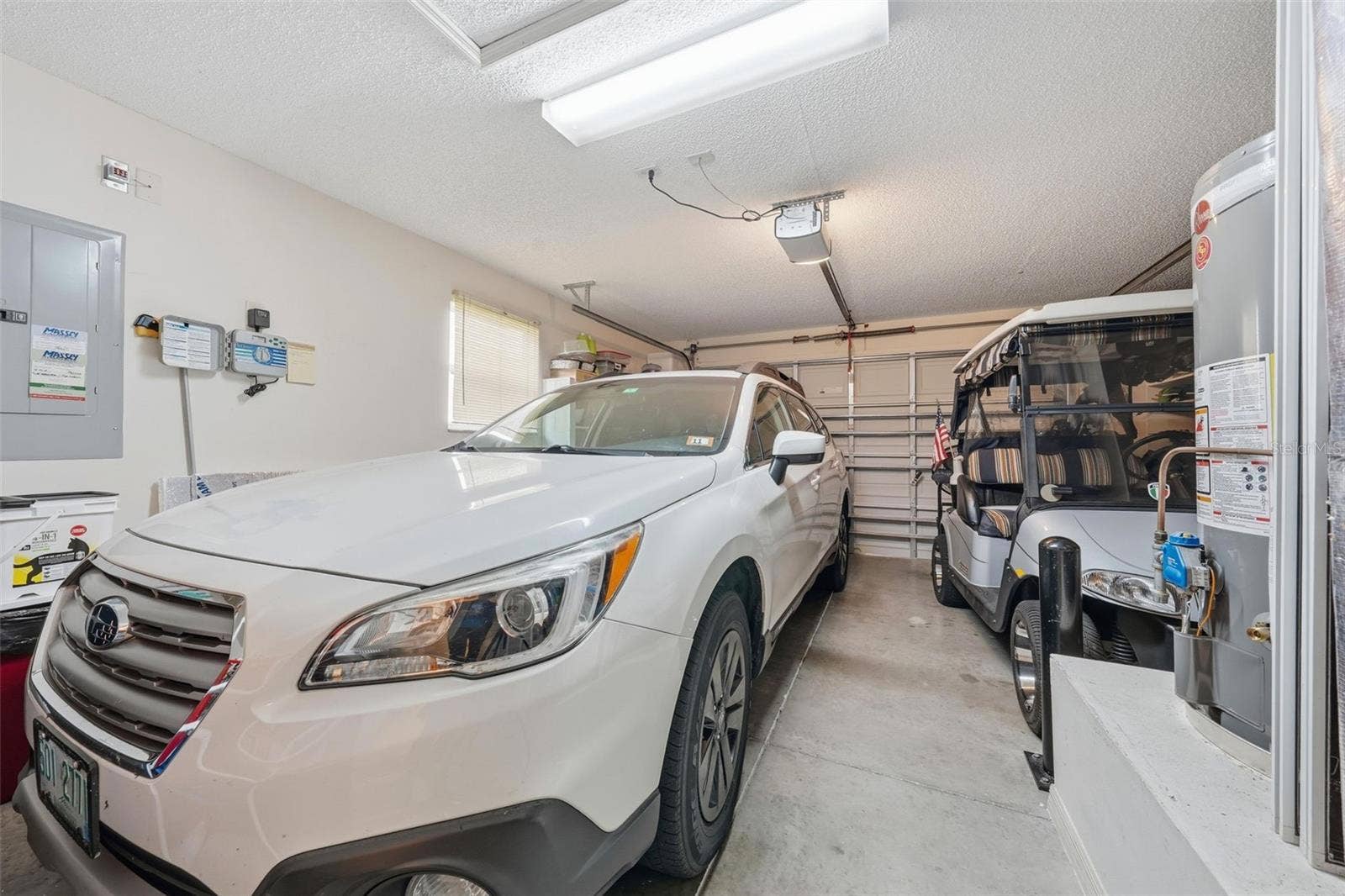 2800 PLAINRIDGE LOOP, The Villages, FL 32162 25'x18' Garage w/Golf Cart