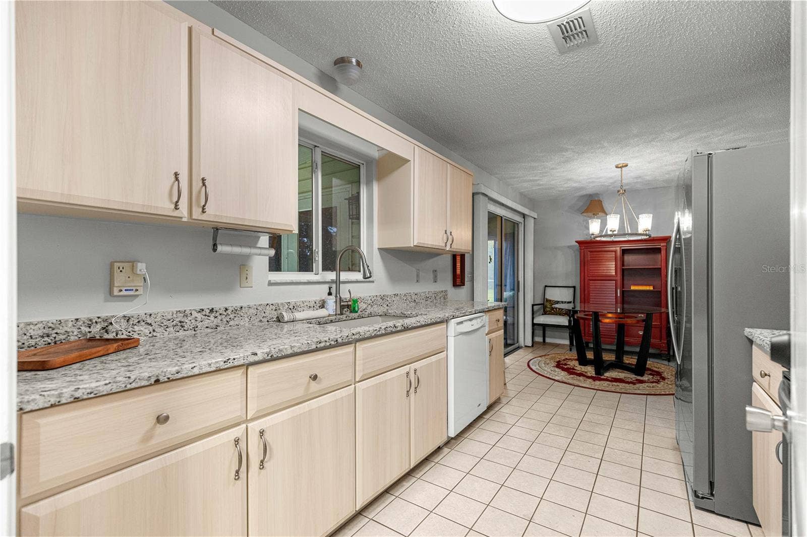 10434 SE 178TH PLACE, Summerfield, FL 34491 KITCHEN TO DINING