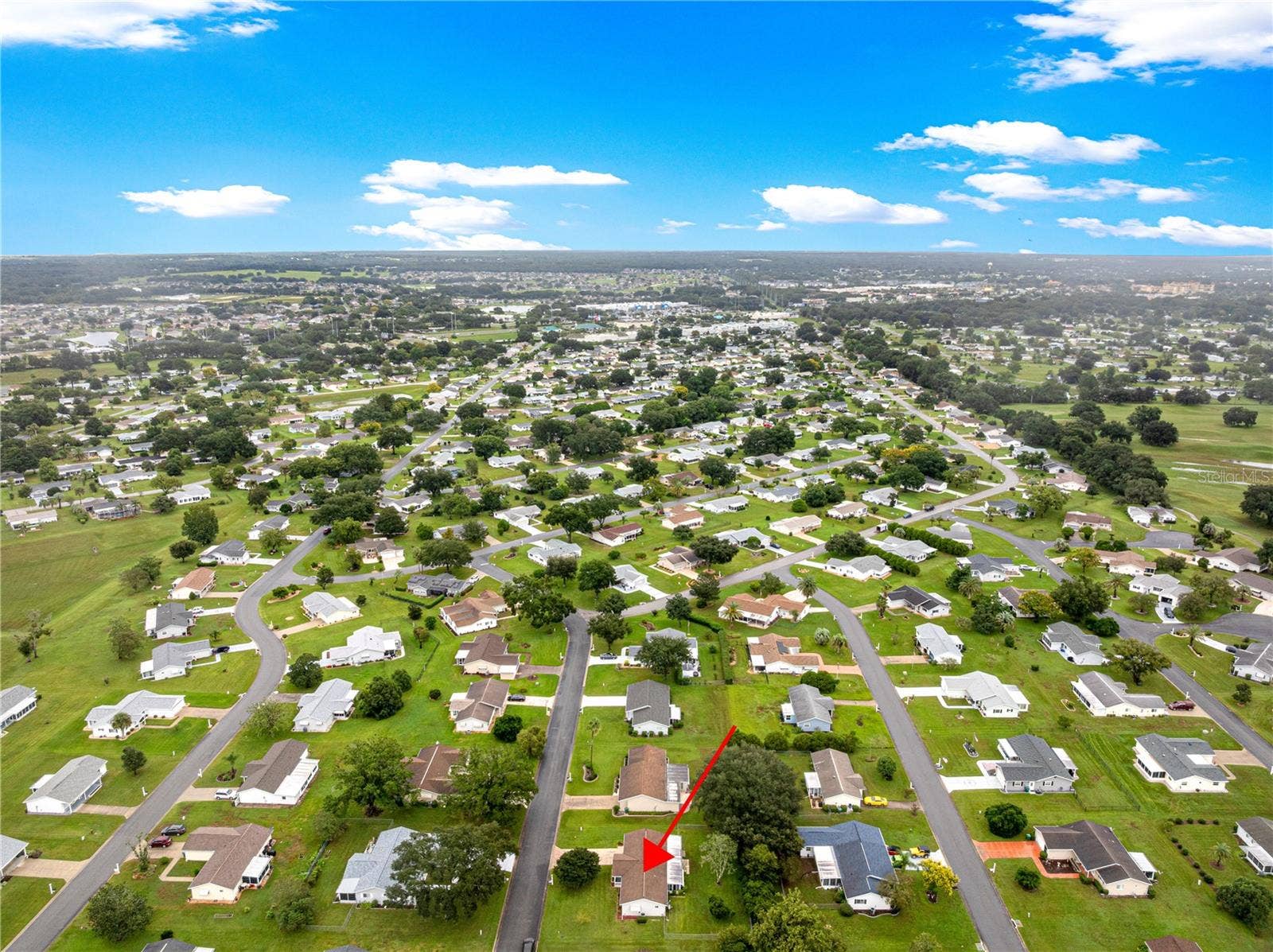 10434 SE 178TH PLACE, Summerfield, FL 34491 AERIAL OF HOUSE AND SURROUNDING HOMES IN COMMUNITY