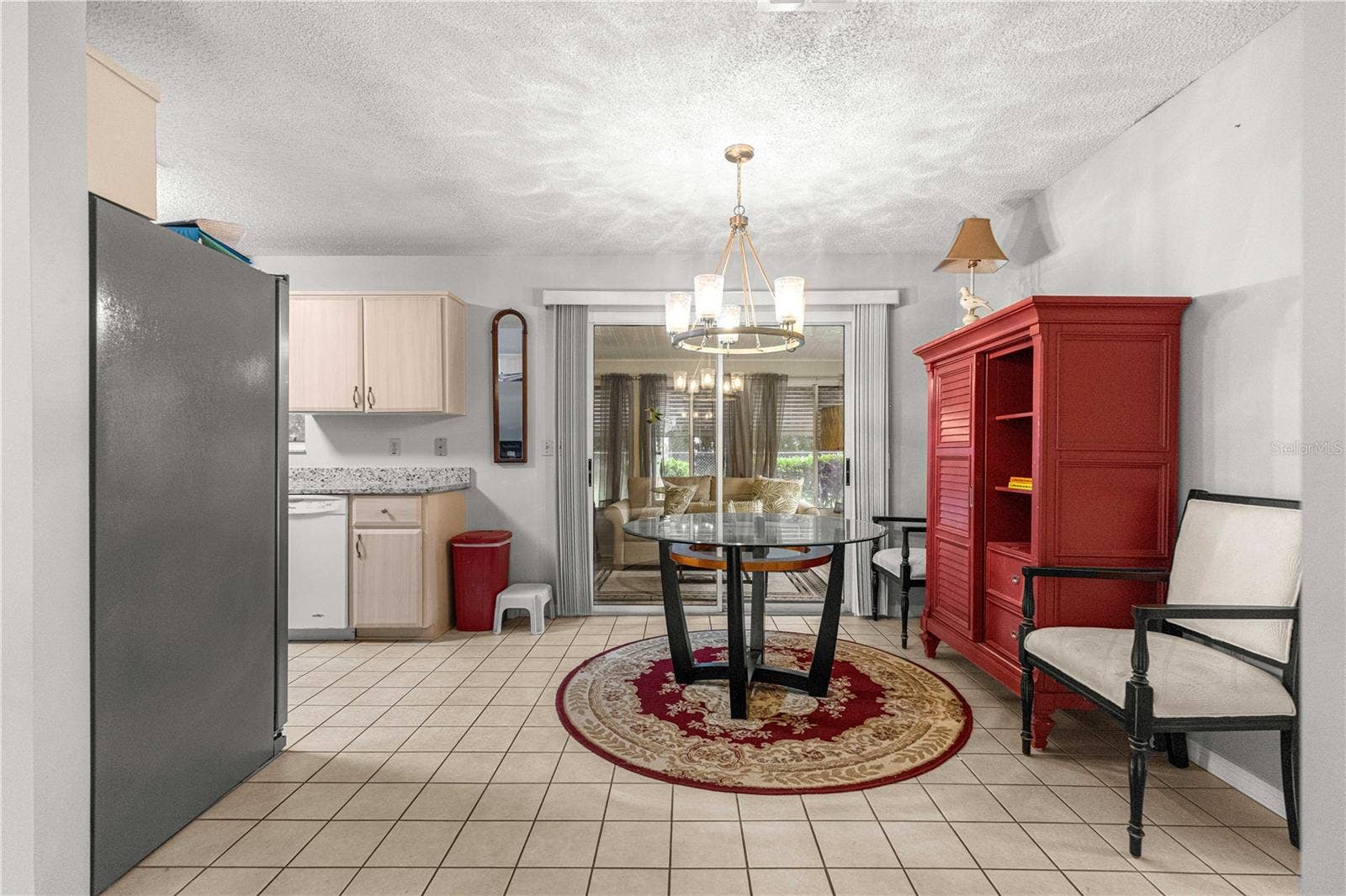 10434 SE 178TH PLACE, Summerfield, FL 34491 DINING TO KITCHEN AND FLORIDA ROOM