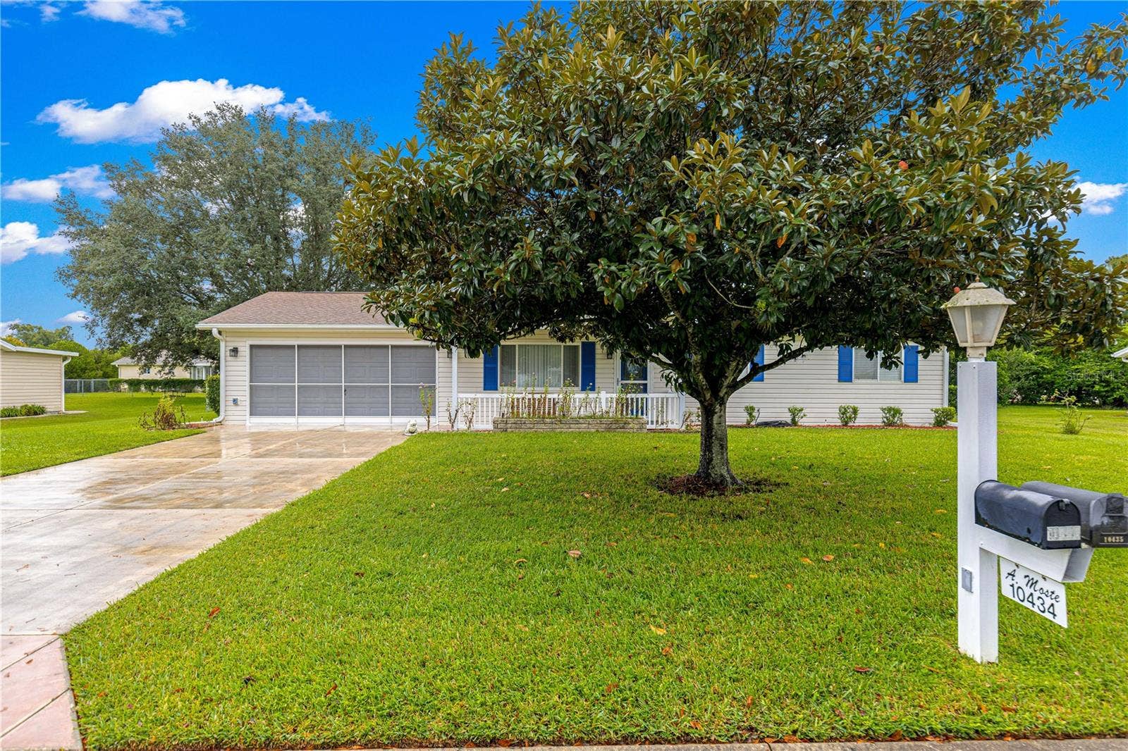 10434 SE 178TH PLACE, Summerfield, FL 34491 FRONT OF HOME SHOWS THE PRIVATE MAILBOX IN FRONT OF THIS HOME