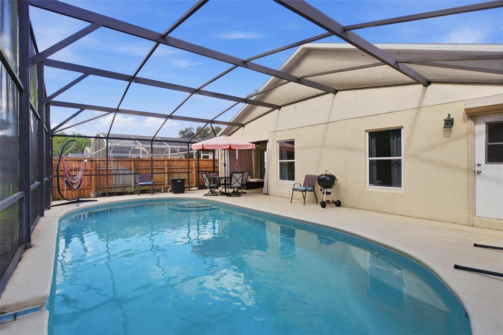945 CLEAR CREEK CIRCLE, Clermont, FL 34714 Sparkling Screened In Pool