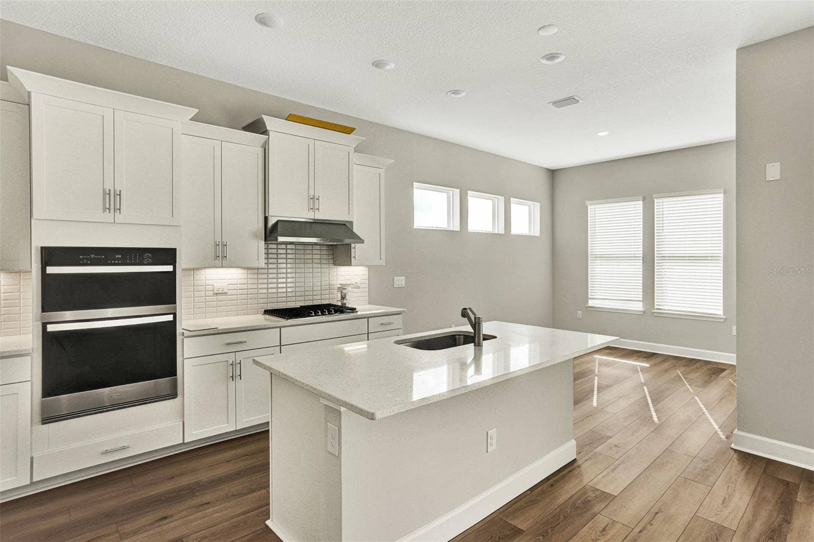 The sample photos included are of the model home and are meant to showcase the craftsmanship and design quality.